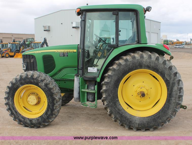image for item E3256 2002 John Deere 6420 MFWD tractor