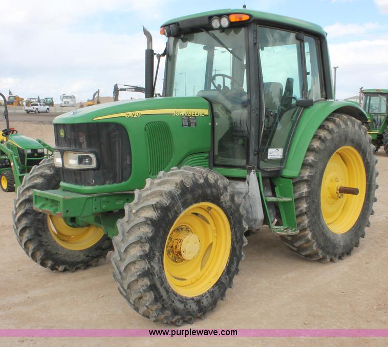 image for item E3256 2002 John Deere 6420 MFWD tractor