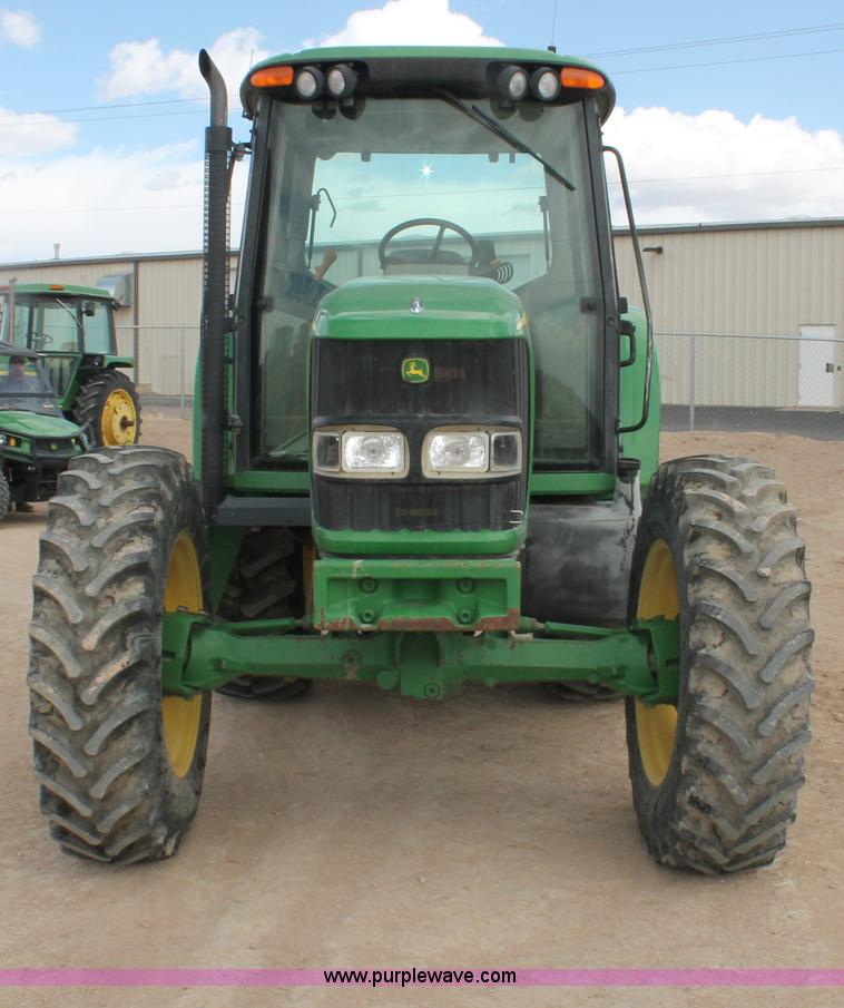 image for item E3256 2002 John Deere 6420 MFWD tractor