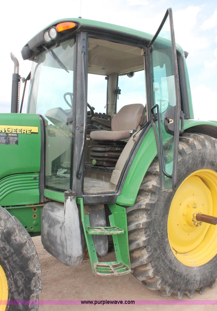 image for item E3256 2002 John Deere 6420 MFWD tractor