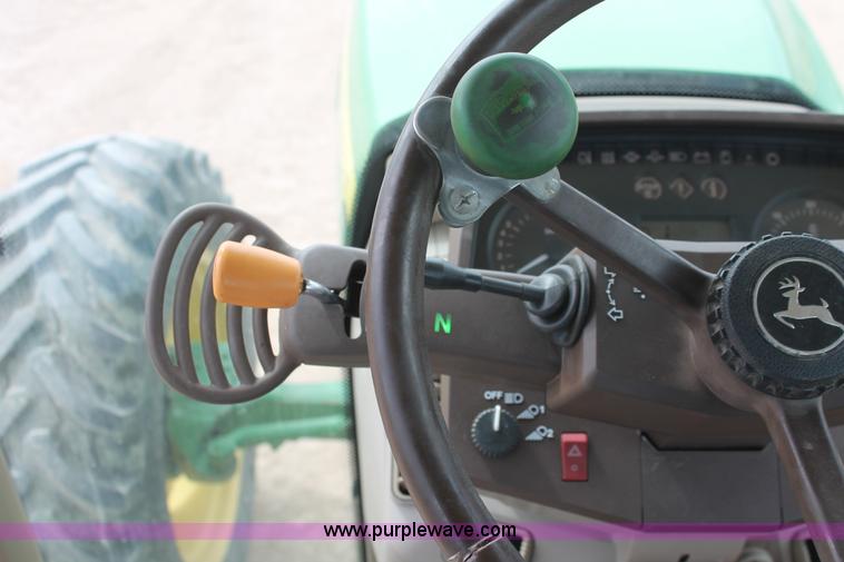 image for item E3256 2002 John Deere 6420 MFWD tractor