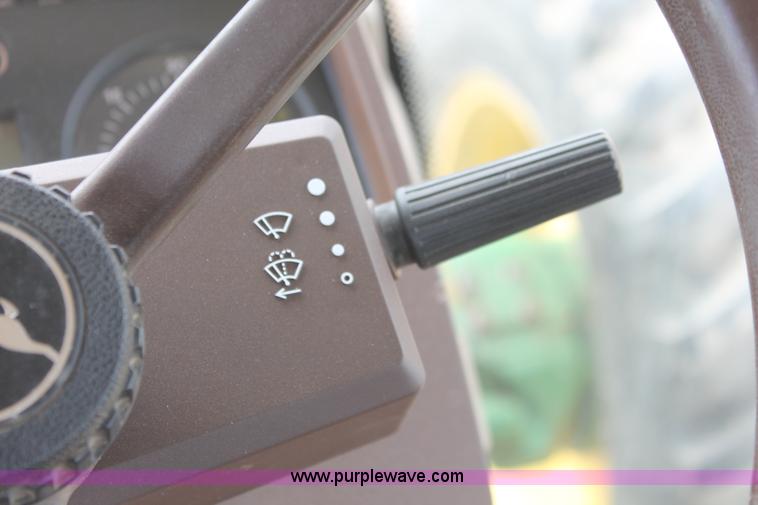 image for item E3256 2002 John Deere 6420 MFWD tractor