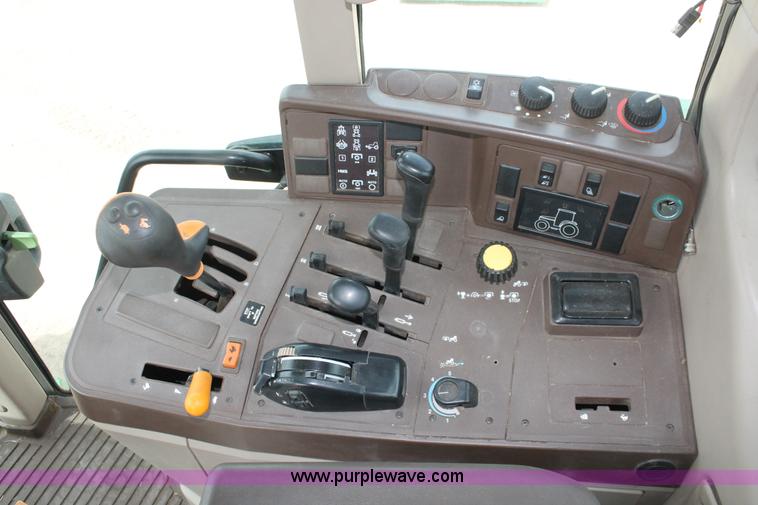 image for item E3256 2002 John Deere 6420 MFWD tractor