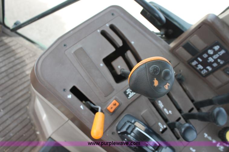 image for item E3256 2002 John Deere 6420 MFWD tractor