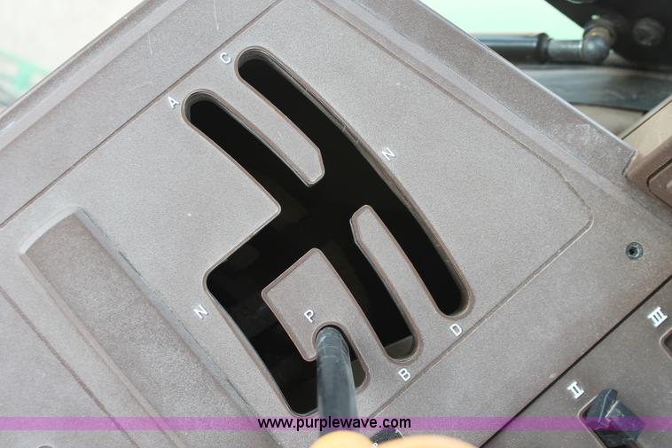 image for item E3256 2002 John Deere 6420 MFWD tractor