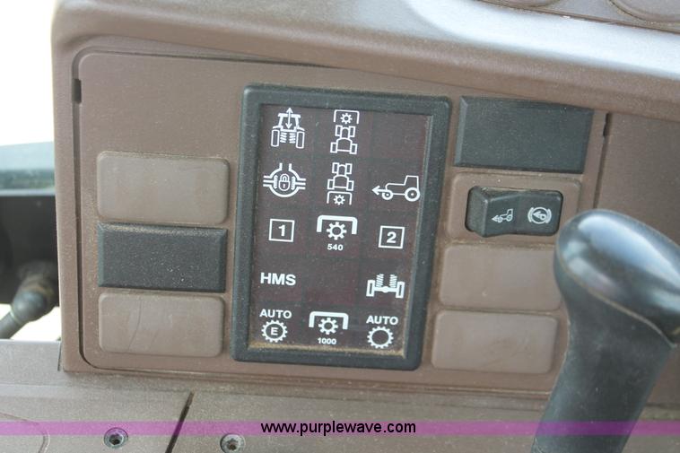 image for item E3256 2002 John Deere 6420 MFWD tractor