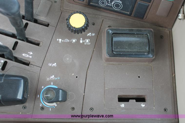 image for item E3256 2002 John Deere 6420 MFWD tractor