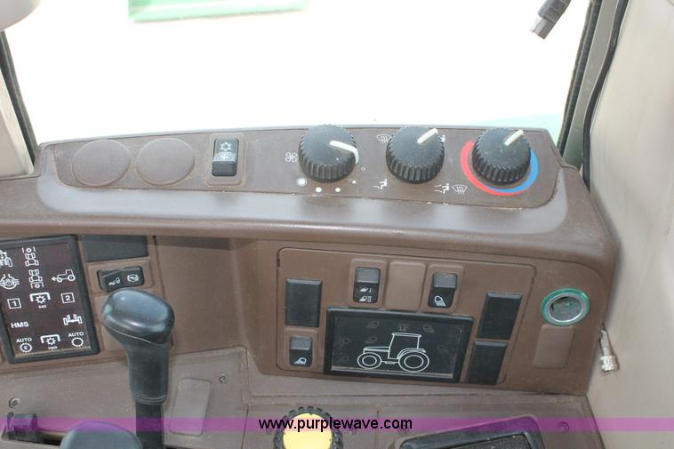 image for item E3256 2002 John Deere 6420 MFWD tractor