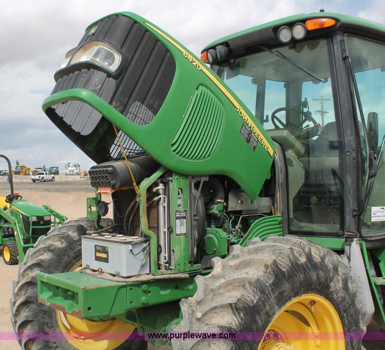 image for item E3256 2002 John Deere 6420 MFWD tractor