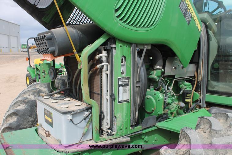 image for item E3256 2002 John Deere 6420 MFWD tractor