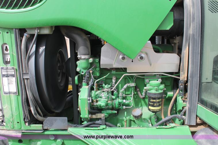 image for item E3256 2002 John Deere 6420 MFWD tractor