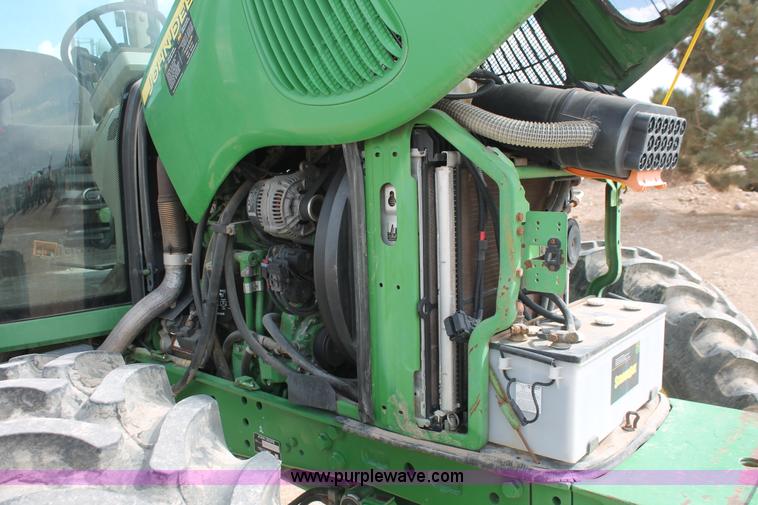 image for item E3256 2002 John Deere 6420 MFWD tractor