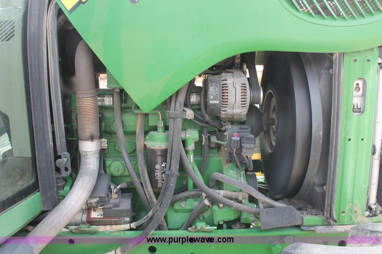 image for item E3256 2002 John Deere 6420 MFWD tractor
