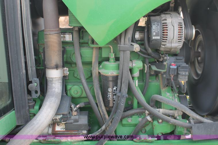 image for item E3256 2002 John Deere 6420 MFWD tractor