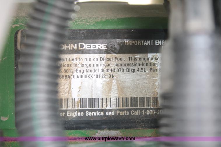image for item E3256 2002 John Deere 6420 MFWD tractor