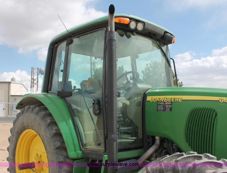 image for item E3256 2002 John Deere 6420 MFWD tractor