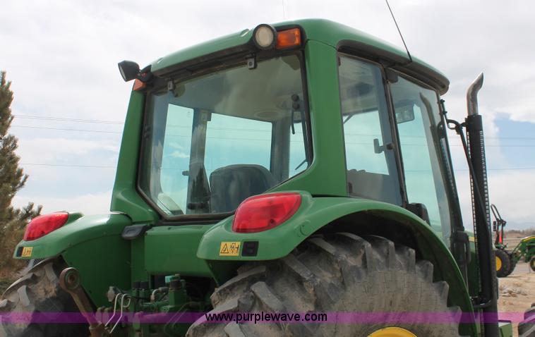 image for item E3256 2002 John Deere 6420 MFWD tractor