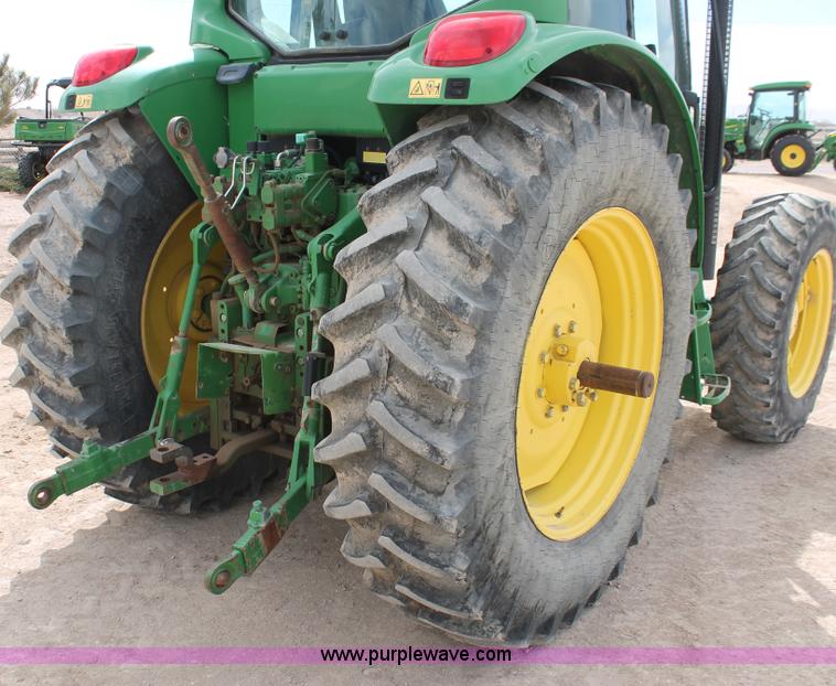 image for item E3256 2002 John Deere 6420 MFWD tractor