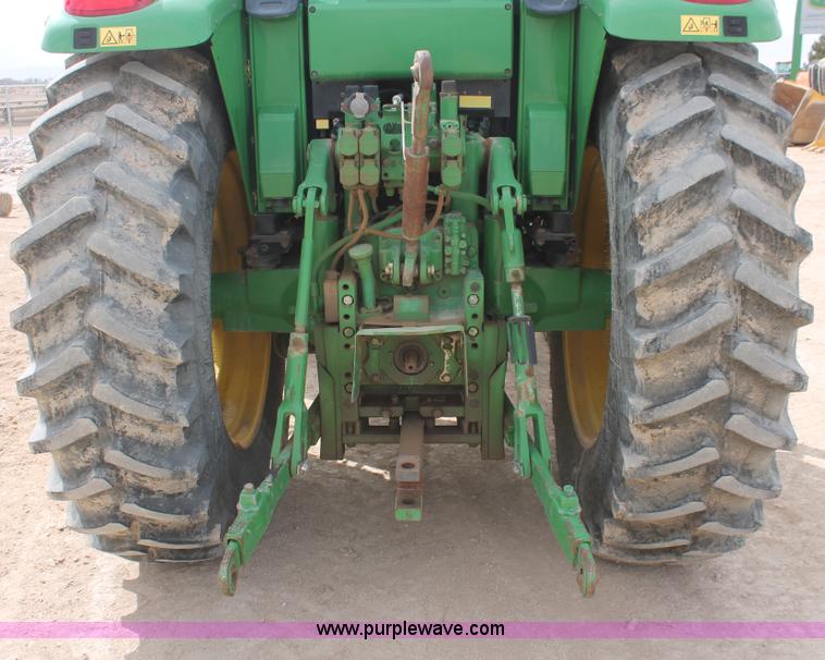 image for item E3256 2002 John Deere 6420 MFWD tractor