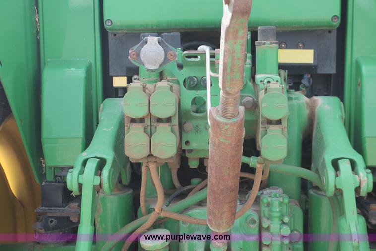 image for item E3256 2002 John Deere 6420 MFWD tractor