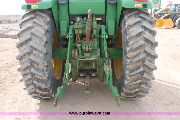 image for item E3256 2002 John Deere 6420 MFWD tractor