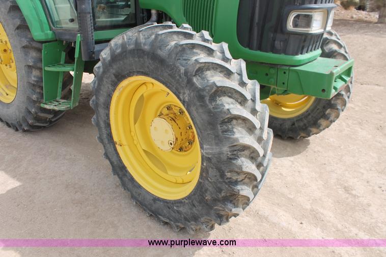 image for item E3256 2002 John Deere 6420 MFWD tractor