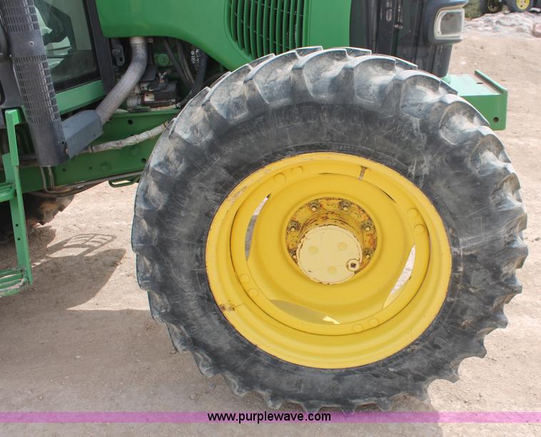 image for item E3256 2002 John Deere 6420 MFWD tractor
