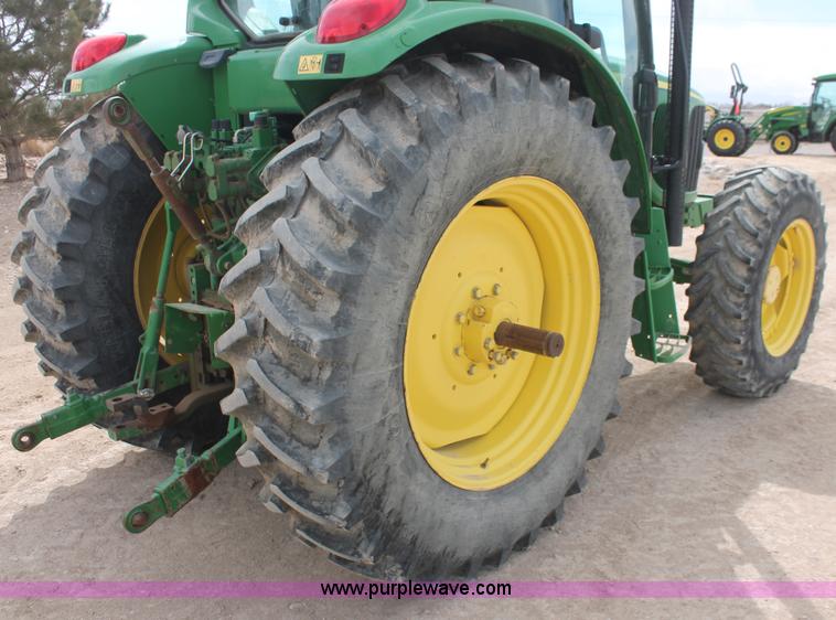image for item E3256 2002 John Deere 6420 MFWD tractor