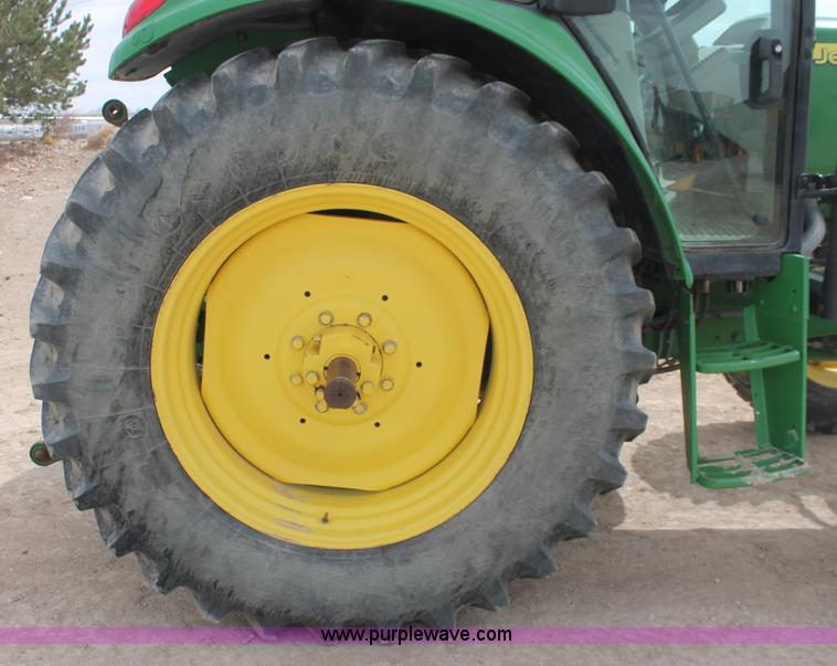 image for item E3256 2002 John Deere 6420 MFWD tractor