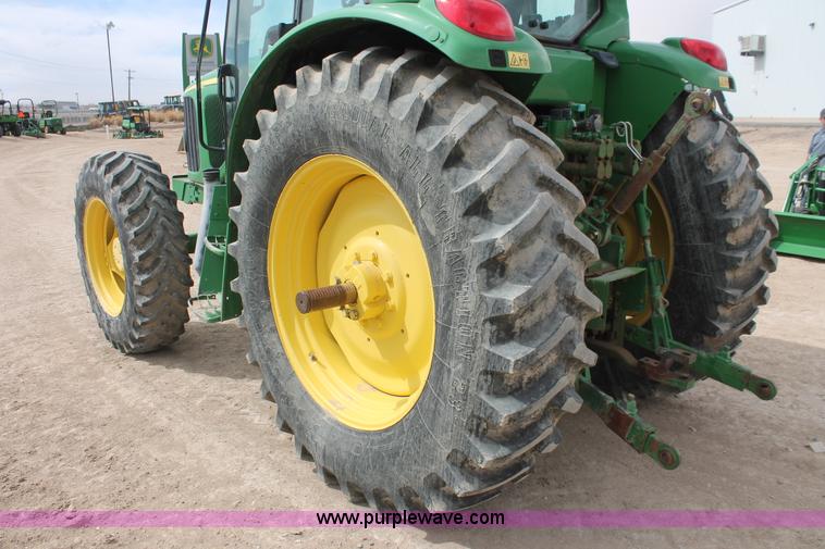 image for item E3256 2002 John Deere 6420 MFWD tractor