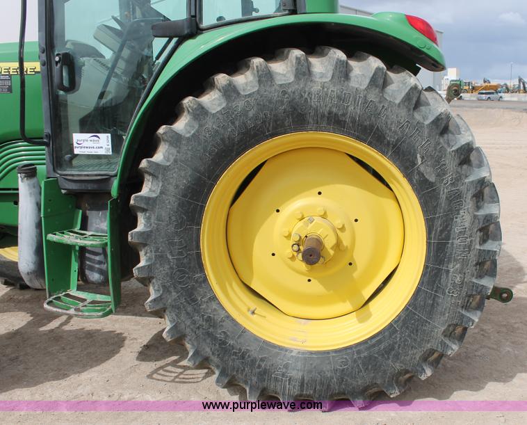 image for item E3256 2002 John Deere 6420 MFWD tractor