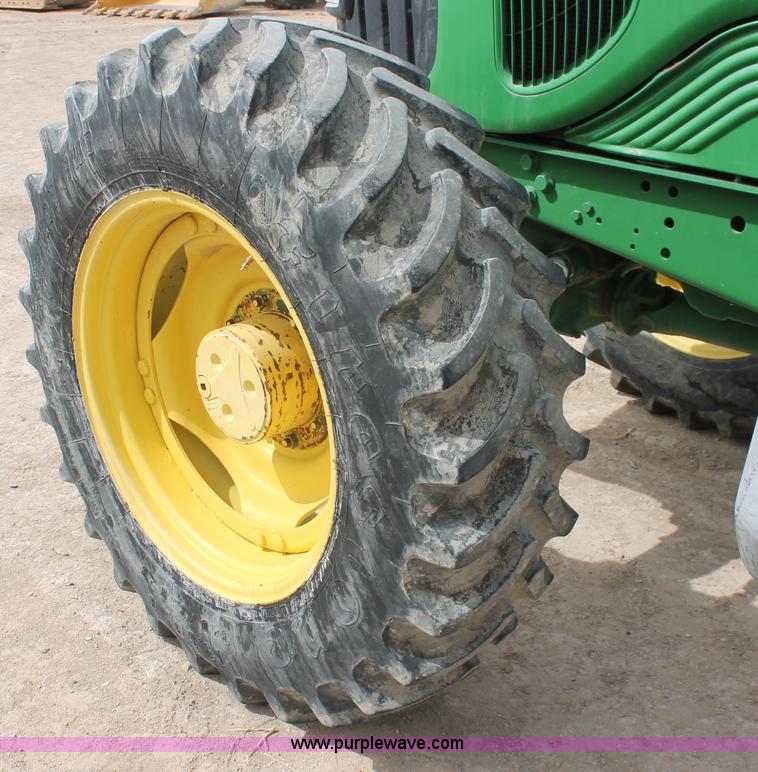 image for item E3256 2002 John Deere 6420 MFWD tractor