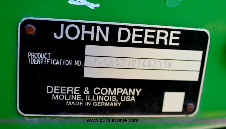 image for item E3256 2002 John Deere 6420 MFWD tractor