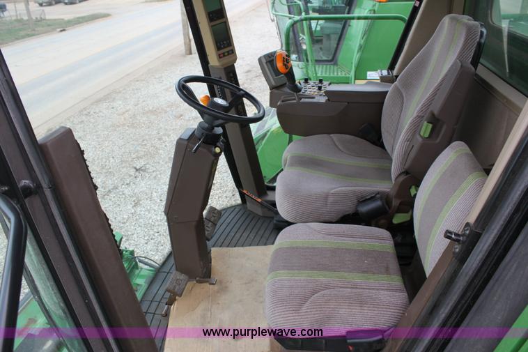 image for item F8702 2011 John Deere 9770 STS RWA combine
