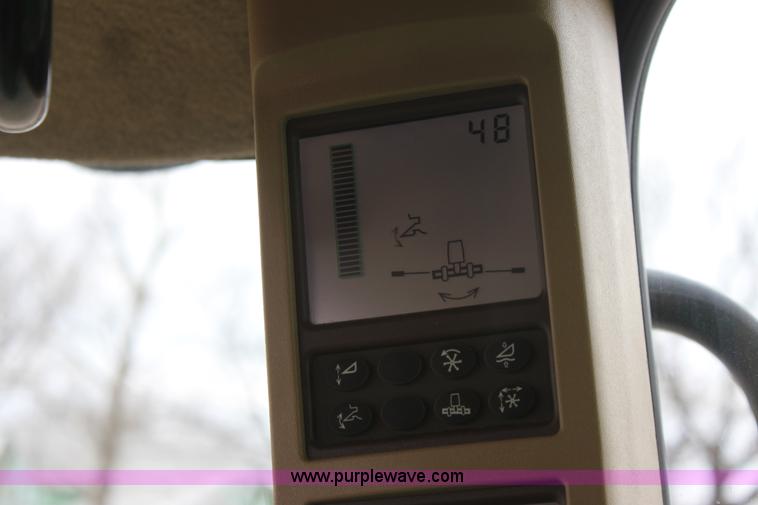 image for item F8702 2011 John Deere 9770 STS RWA combine