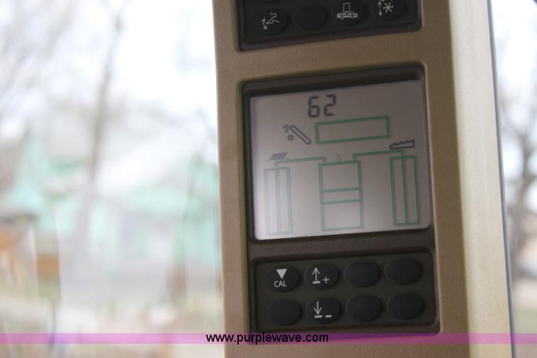 image for item F8702 2011 John Deere 9770 STS RWA combine