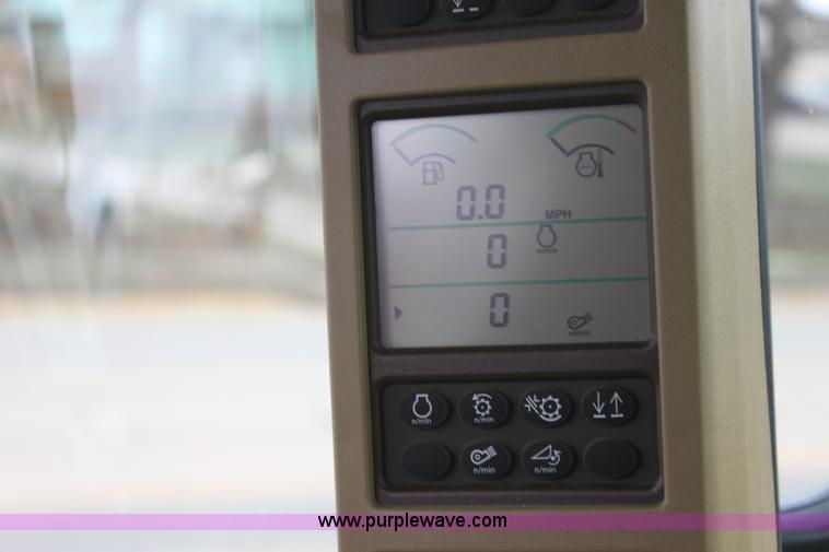 image for item F8702 2011 John Deere 9770 STS RWA combine