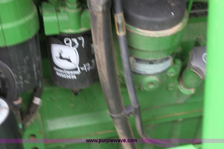 image for item F8702 2011 John Deere 9770 STS RWA combine