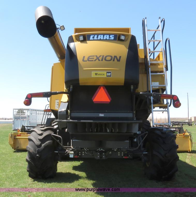 image for item F8776 2009 Caterpillar Lexion 560R 2WD combine