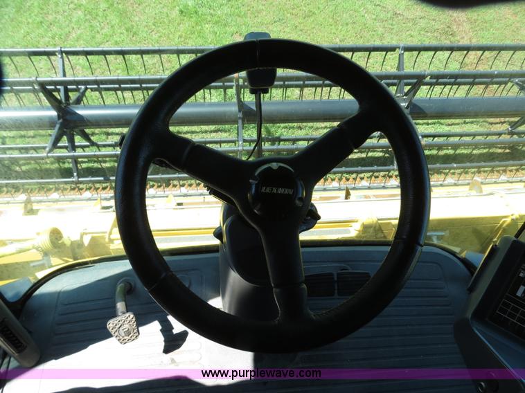 image for item F8776 2009 Caterpillar Lexion 560R 2WD combine