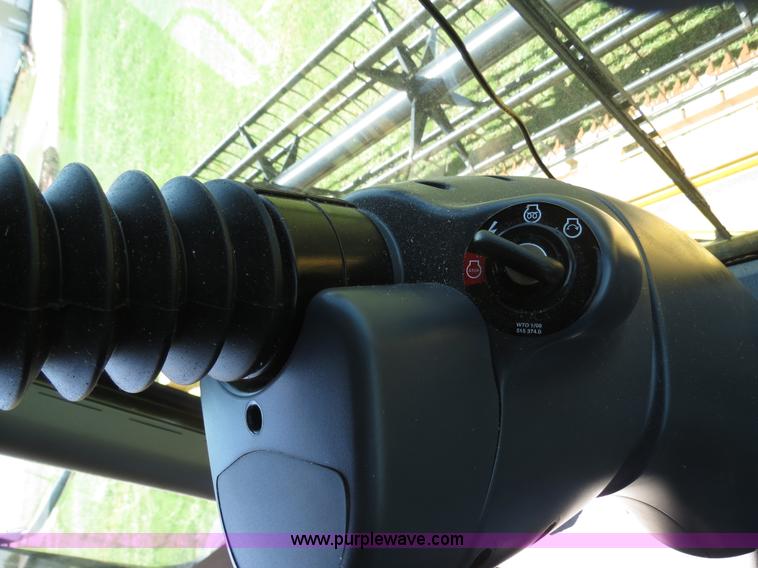 image for item F8776 2009 Caterpillar Lexion 560R 2WD combine