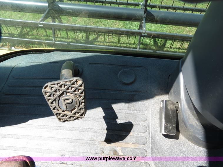 image for item F8776 2009 Caterpillar Lexion 560R 2WD combine