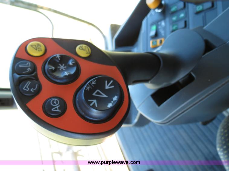 image for item F8776 2009 Caterpillar Lexion 560R 2WD combine