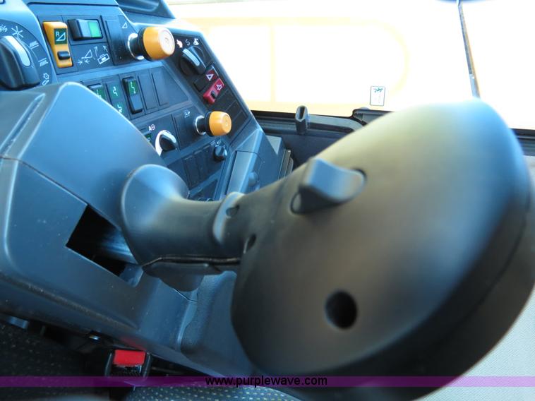 image for item F8776 2009 Caterpillar Lexion 560R 2WD combine