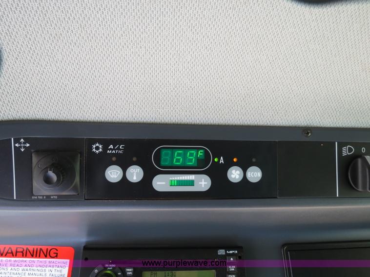 image for item F8776 2009 Caterpillar Lexion 560R 2WD combine