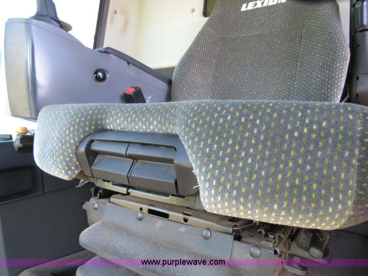 image for item F8776 2009 Caterpillar Lexion 560R 2WD combine