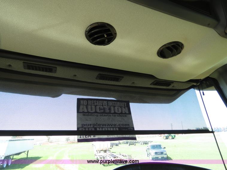 image for item F8776 2009 Caterpillar Lexion 560R 2WD combine