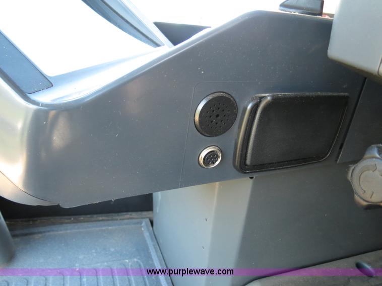 image for item F8776 2009 Caterpillar Lexion 560R 2WD combine