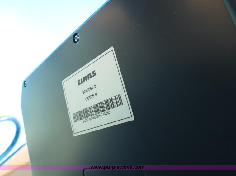 image for item F8776 2009 Caterpillar Lexion 560R 2WD combine