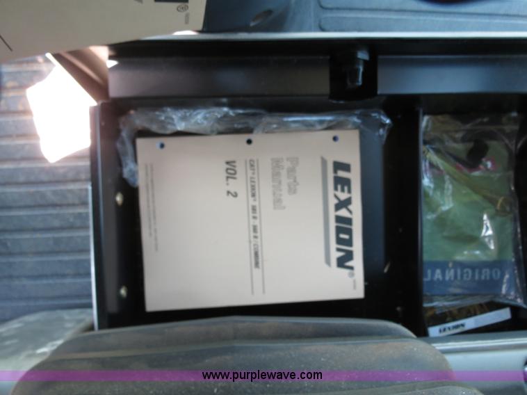 image for item F8776 2009 Caterpillar Lexion 560R 2WD combine